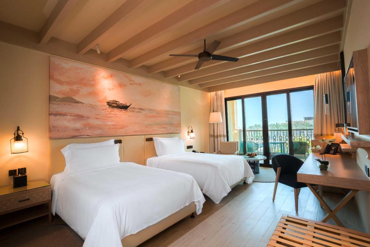 Saadiyat Rotana Resort And Villas Abu Dhabi Esterno foto Deluxe Room