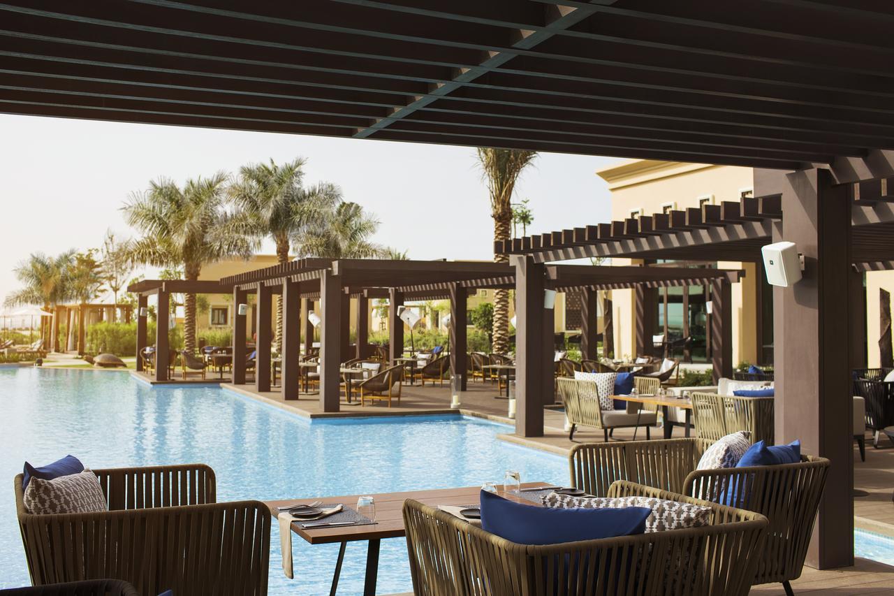 Saadiyat Rotana Resort And Villas Abu Dhabi Esterno foto The pool at the hotel